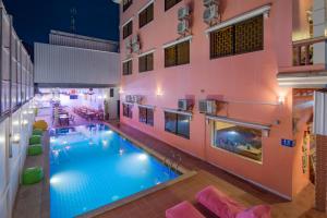 an overhead view of a swimming pool in a building at The Siem Reap Chilled Backpacker in Siem Reap
