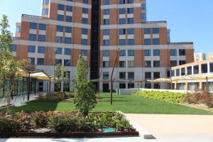Vonkajšia záhrada v ubytovaní Hotel Alimara