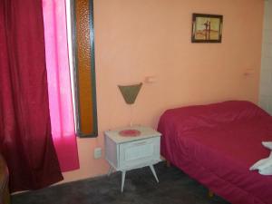 Una cama o camas en una habitación de Hosteria Aura Azul (ex Ser Azul)