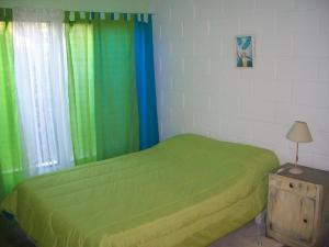 Una cama o camas en una habitación de Hosteria Aura Azul (ex Ser Azul)