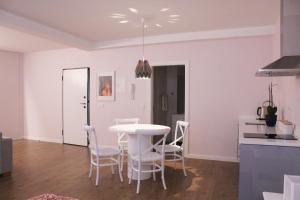 Kuchyň nebo kuchyňský kout v ubytování Apartments VMadeira