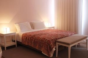 Postel nebo postele na pokoji v ubytování Apartments VMadeira