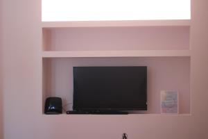 TV a/nebo společenská místnost v ubytování Apartments VMadeira