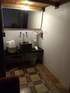 Ett badrum på Hostería de Río - C92
