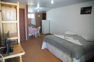 Katil atau katil-katil dalam bilik di Pousada do Francês
