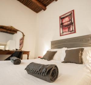 En eller flere senge i et værelse på DUOMO 22