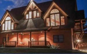 a large house with a gambrel roof at Second Wind Country Inn in Ashland