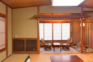 Posezení v ubytování Kappo Ryokan Shiroyama