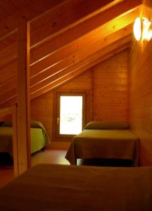 Postel nebo postele na pokoji v ubytování Lago Resort