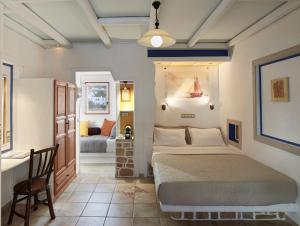 Cama ou camas em um quarto em Polikandia Hotel