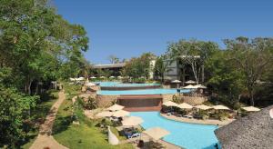 an aerial view of a pool at a resort at Baobab Beach Resort & Spa in Diani Beach