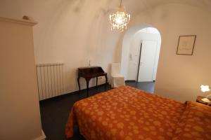 Postel nebo postele na pokoji v ubytování Castello 20