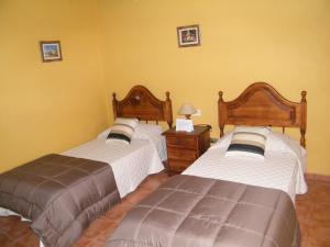 Кровать или кровати в номере Casa Rural San José
