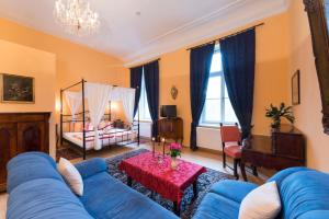 Postel nebo postele na pokoji v ubytování Schlosshotel Rühstädt Garni - Natur & Erholung an der Elbe + 16 fotografií