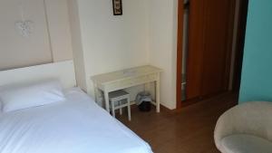Postel nebo postele na pokoji v ubytování Hotel Marbel