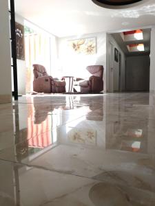 Posezení v ubytování Al Maha Residence Rak