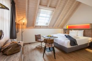 Voodi või voodid majutusasutuse Boutiquehotel Thessoni Classic & Self service Residence Home Zürich toas