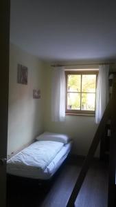 Un pat sau paturi într-o cameră la Appartamenti Milli