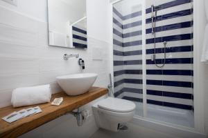 Ett badrum på Residence Le Terrazze