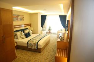 Tempat tidur dalam kamar di Yol Is Holiday Trabzon