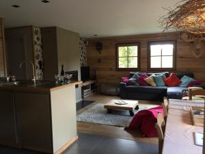 Posezení v ubytování Chalet Le Forestier