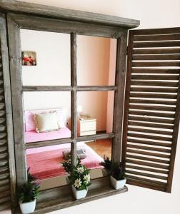 Ένα ή περισσότερα κρεβάτια σε δωμάτιο στο A Casa di Ida