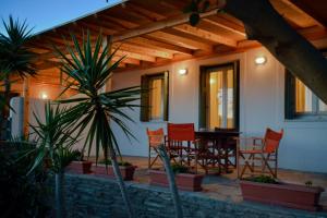 Patio nebo venkovní prostory v ubytování Villa Pergola Andros