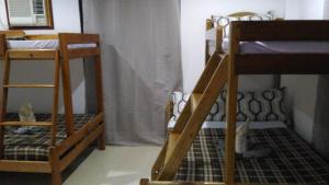 Postel nebo postele na pokoji v ubytování Sealor Pension House