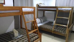 Postel nebo postele na pokoji v ubytování Sealor Pension House
