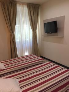 TV a/nebo společenská místnost v ubytování Villa Accini