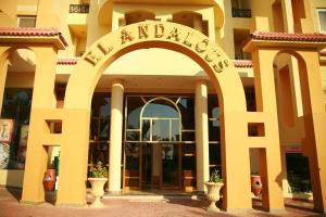 a building with a sign that reads new nleans at 310 el Andalous Apartment in Hurghada