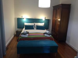 Cama ou camas em um quarto em Casa Do Populo