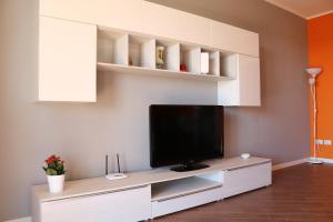 TV a/nebo společenská místnost v ubytování Villetta Airone