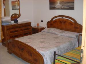A bed or beds in a room at Come a casa