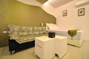 Posezení v ubytování Easy Home Stay
