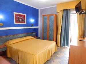 Postel nebo postele na pokoji v ubytování Hotel Blumentag