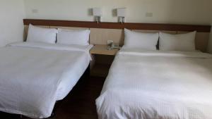 Postelja oz. postelje v sobi nastanitve Light Blue Hostel