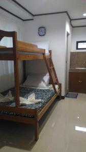 Postel nebo postele na pokoji v ubytování Sealor Pension House