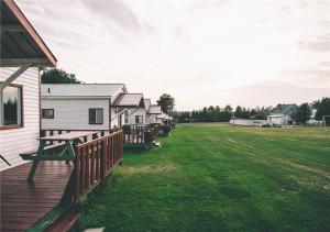 Photo de la galerie de l'établissement Island Life Cottages, à Brackley Beach