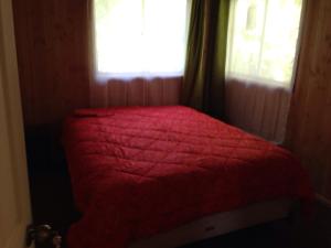 Postel nebo postele na pokoji v ubytování Cabañas El Boldo