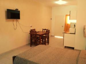 TV a/nebo společenská místnost v ubytování Departamentos Flor de Loto