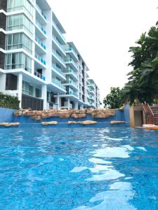 Bazén v ubytování My Resort Hua Hin D605 By Chutha nebo v jeho okolí