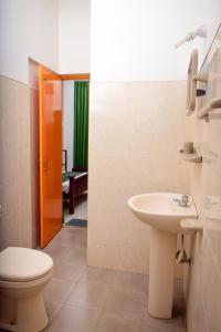 Koupelna v ubytování Vishmee Holiday Inn