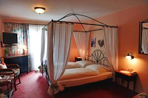 Кровать или кровати в номере Hotel Kienberger Hof +54 фотографии