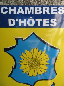 a yellow sign with a sunflower on it at Mas de L'Ermitage in Lattes