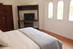Кровать или кровати в номере Casa Mirabonita