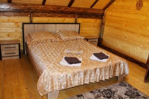 Ліжко або ліжка в номері Szlachta Cottage