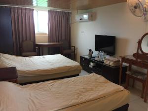 Postel nebo postele na pokoji v ubytování Kawada House Homestay