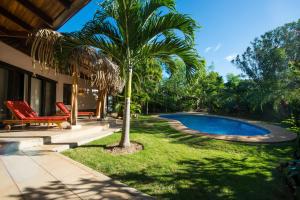 The swimming pool at or near Tamarindo Dreams Villas with private pool