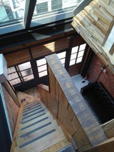 an overhead view of a staircase in a building at 小巷窄 in Tainan